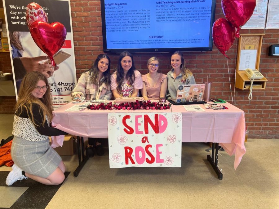 Alpha Phi sisters in the student center for the Send a rose event.