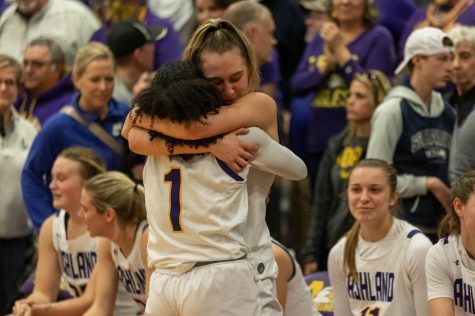 Eagle transfers Savaya Brockington and Maddie Maloney embrace one another after winning the Midwest Regional Championship.