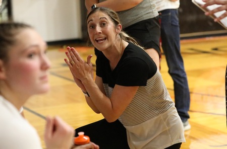 Head Coach Katie Kuhn coaches the Ohio Northern Polar Bears in a midseason competition during the 2022 season. 
