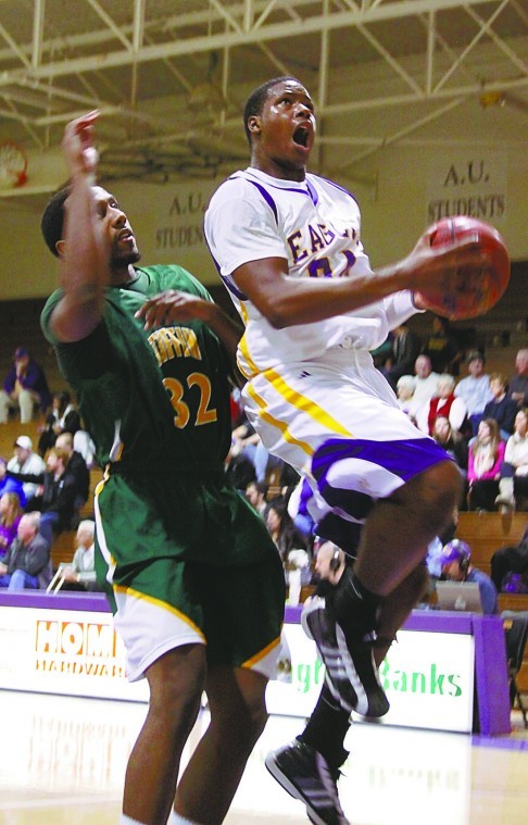 Tiffin University junior Brandon Harris defends as Ashland University sophomore Evan Yates attempts to score during their game on Thursday, Jan. 13, 2011. Photo by Brian M. Wells