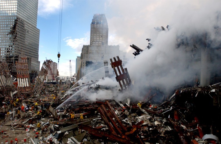 NAV2001091701 - 14 SEPTEMBER 2001 - NEW YORK, NEW YORK, USA:
Three days after a September 11, 2001, terrorist attack, fires
still burn amidst the rubble of the World Trade Center in New York.
rlw/U.S. Navy Photo/Jim Watson UPI
