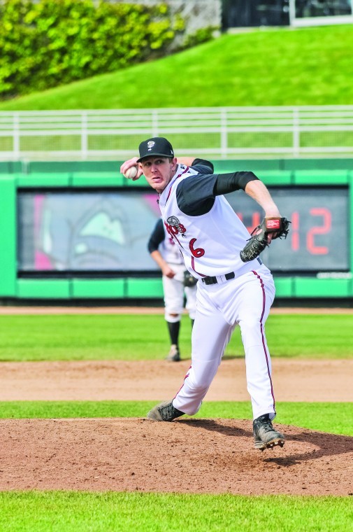 Ajay Meyer pitches in a game earlier this year for the Lansing Lugnuts. As of Aug. 15, Meyer has recorded 31 saves, a franchise record.
