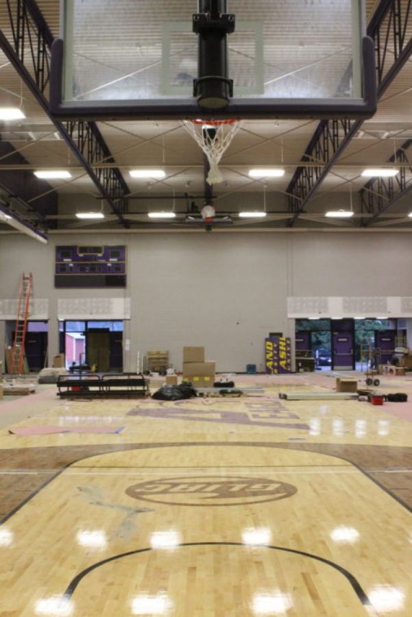 Crews+worked+all+summer+in+Kates+to+have+it+ready+for+the+first+home+volleyball+game+of+the+season.+A+new+floor%2C+bleachers%2C+lighting%2C+basketball+hoops%2C+scoreboards%2C+and+even+new+paint+on+the+walls+were+a+part+of+Kates+transformation.