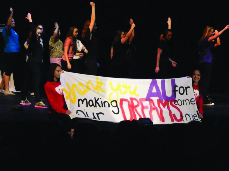 Alpha Phi sisters pose at the end of their show: When I Grow Up