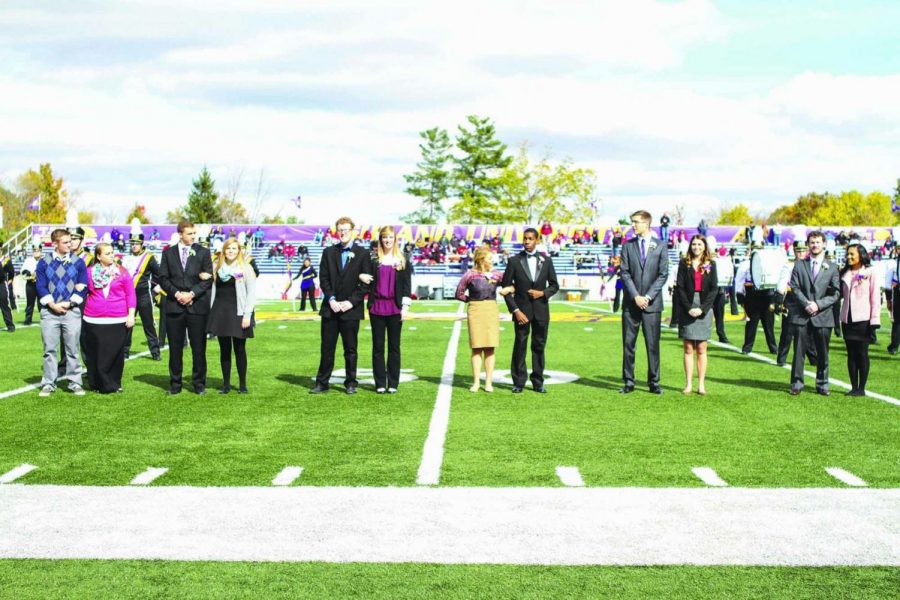 Ashland Universitys homecoming court stands on the football field at halftime of Saturdays game. 