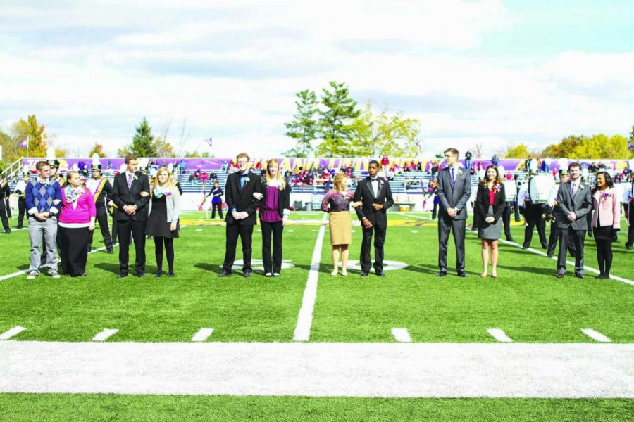 Ashland University's homecoming court stands on the football field at halftime of Saturday's game. 