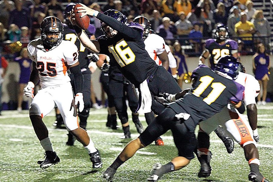 “Jumpman” Travis Tarnowski leaps into the end zone givng the Eagles a 12 point lead over Findlay. 