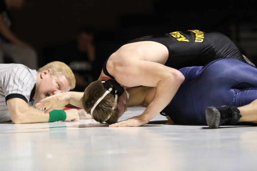 The wrestling team claimed four titles at the Simonson Open, but head coach Josh Hutchens still believes they can improve as the season progresses.