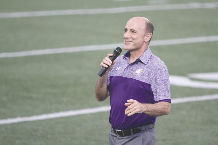 President Carlos Campo speaks at the White Out Pep Rally, one of the many events AU is hosting involving both the campus and the community. 