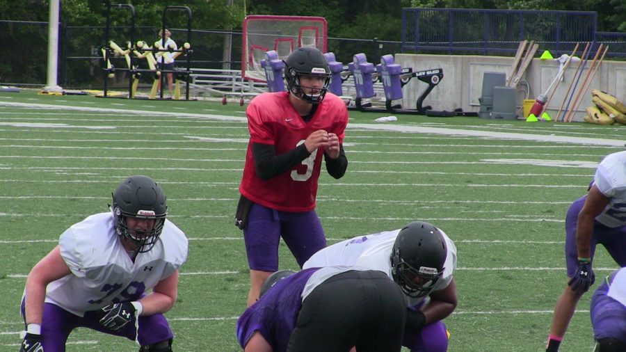 Quarterback Billy Bahl lines up for a shotgun snap in the Eagles second team scrimmage.