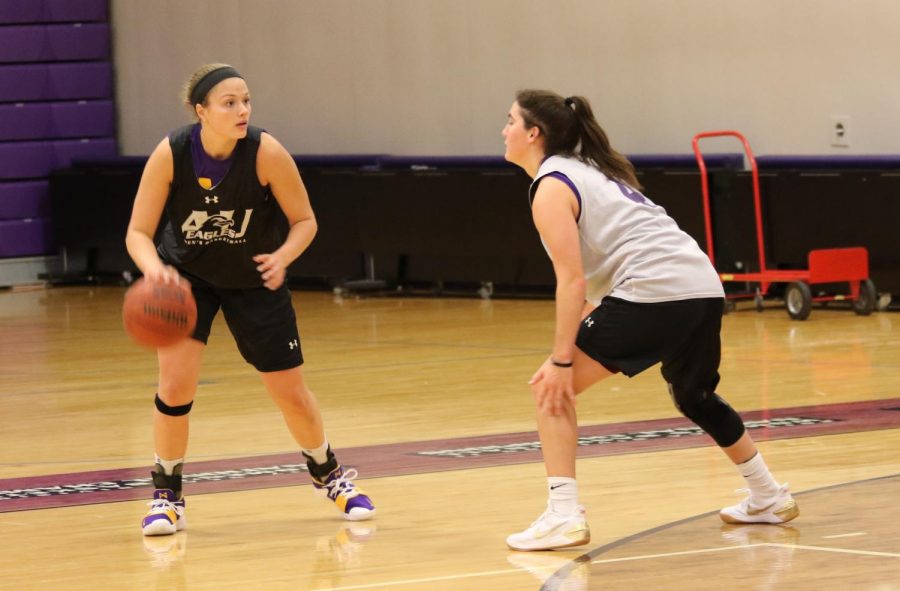 AU junior guard Renee Stimpert defends fellow teammate Maddie Dackin in a practice for the Eagles earlier this season. 