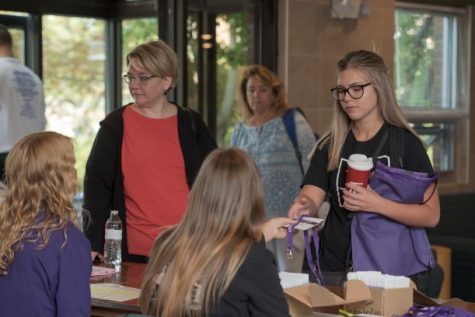 Freshmen prepare to move onto campus for the first time at Amstutz Hall.