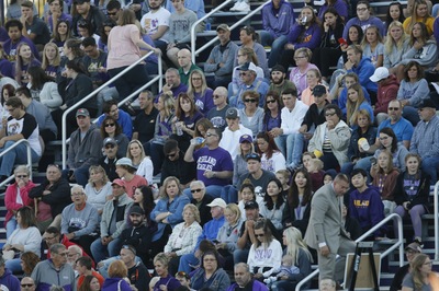 Students and fans in the stadium during the game