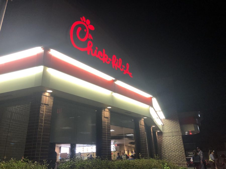 One of the Chick-fil-A franchises, busy as ever, even when its late at night.