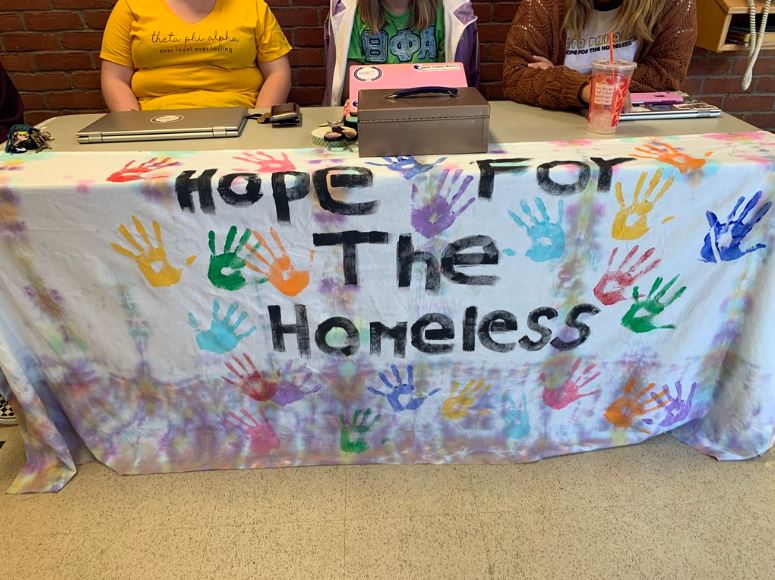 The help for the homeless fundraising table was set up in the student center, collecting money for various organizations that give money to those who need it most.