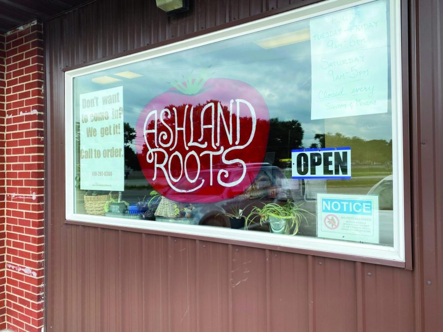 The Ashland Roots window lists hours and curbside pickup information.