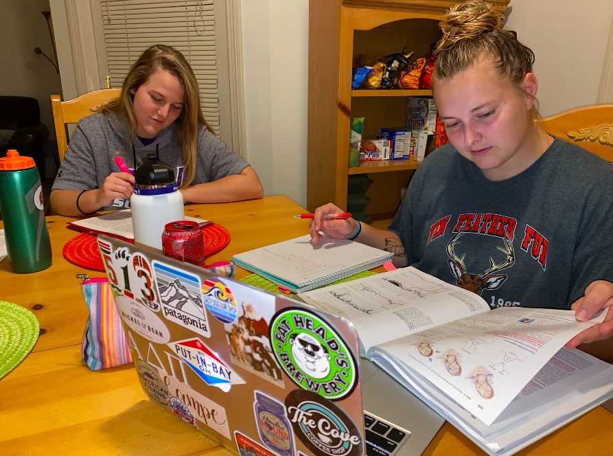 Seniors Alexa Jacob and Abby Lampe gear up for fast-approaching  midterms.