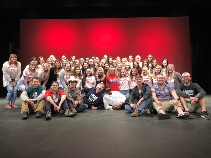 Members of Alpha Phi alongside Mr. University participants following the event in 2019.