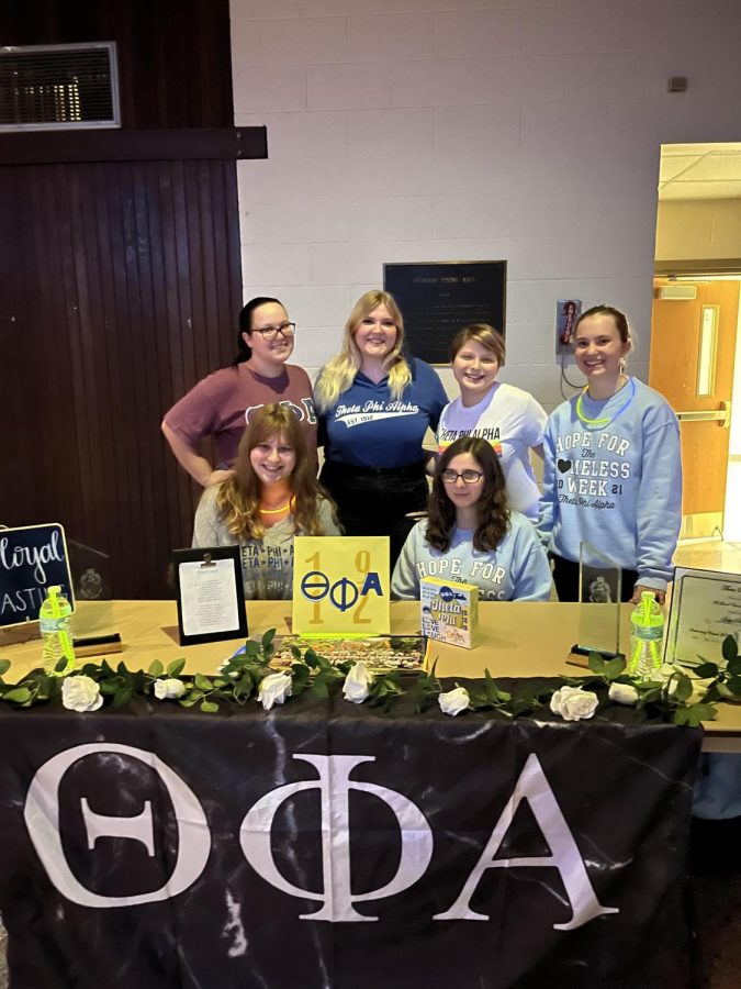 The newest sorority on AU campus, Theta Phi Alpha attended the Glow Greek event in Redwood Hall.