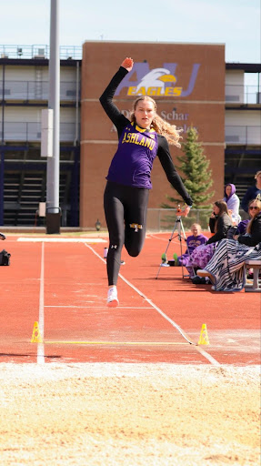 Sophomore Grace Miller prepares to perform a long jump in the Northeast Ohio Tri at the Dwight Schar Athletic Complex.