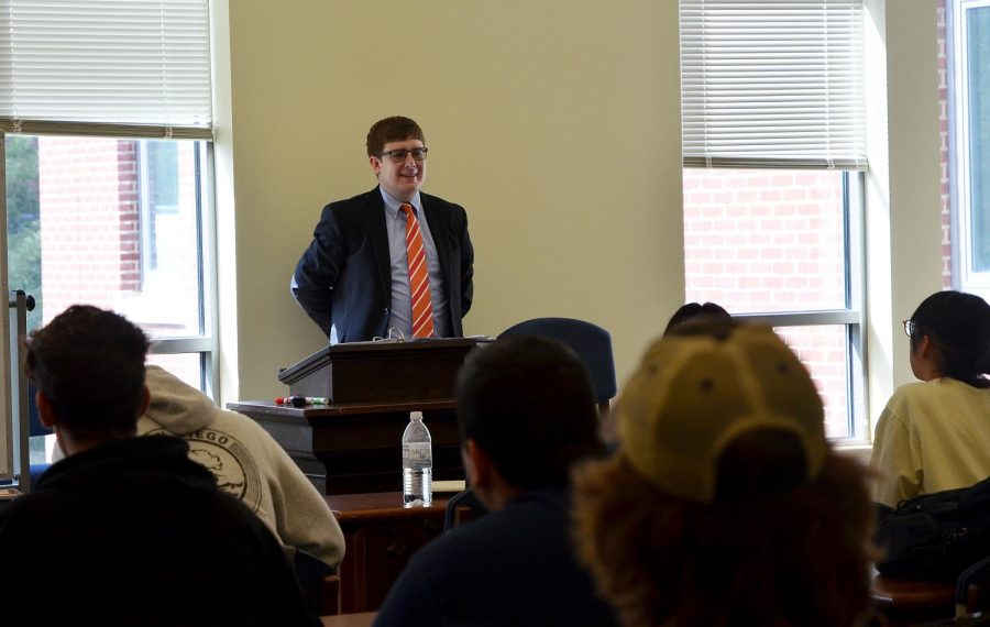 Dr. Benjamin Slomski teaching on American History. In addition to embedded coaching, students can seek tutoring available to all students open by appointment and walk-in tutoring.