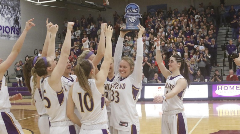 The Eagles hoist the GLIAC trophy above their heads during the 2019-2020 season after taking down Grand Valley State.