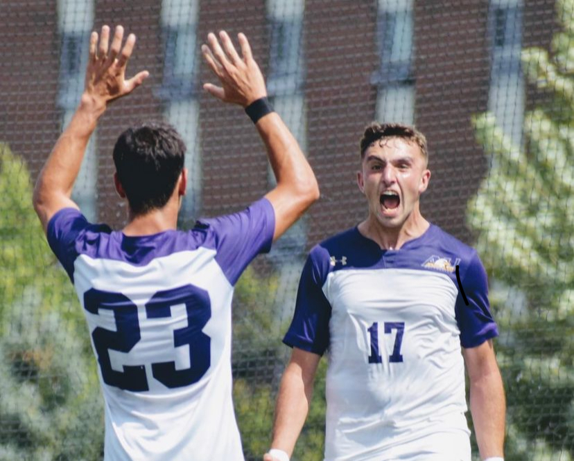 Eagles Vander Rocha and Sam Jordan celebrate after scoring a goal in non-conference play. 