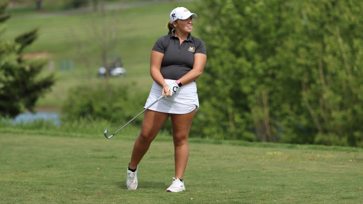 Eagle junior womens golf athlete Grace Grant competes for the team.