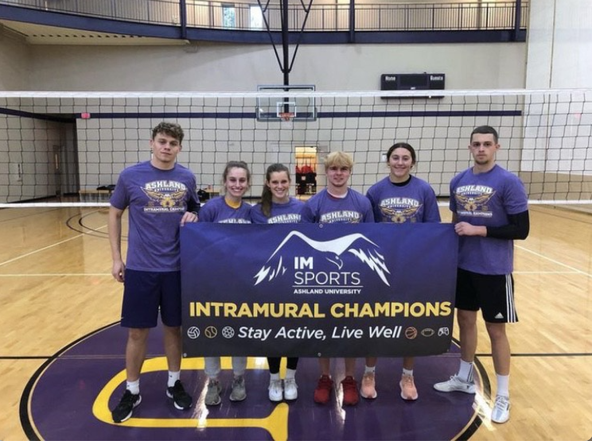 The winning team poses with the championship banner after the tournament last year.  