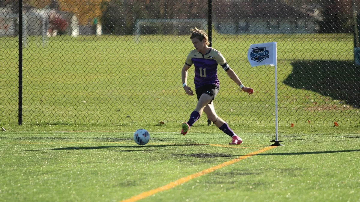 Eagle Oliver Whaley kicks the ball for the team in the 2023 G-MAC playoffs.