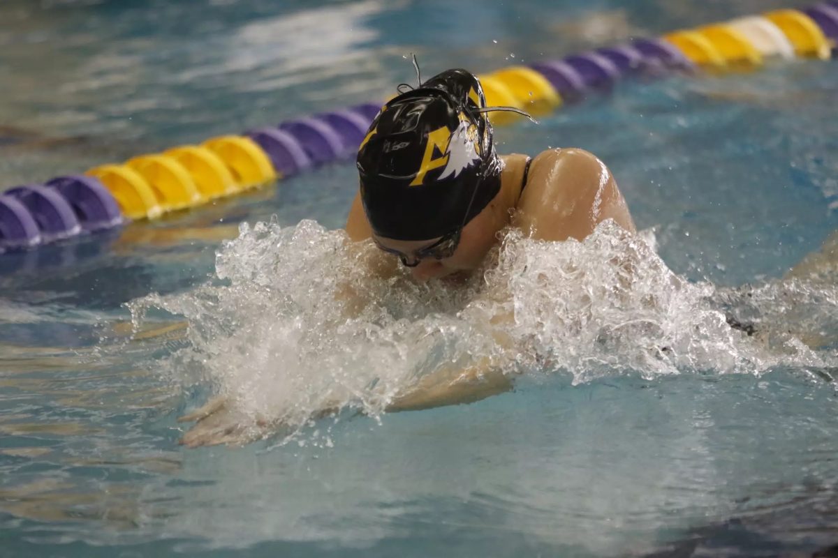 Laughlin swimming during her time as an undergraduate student-athlete.