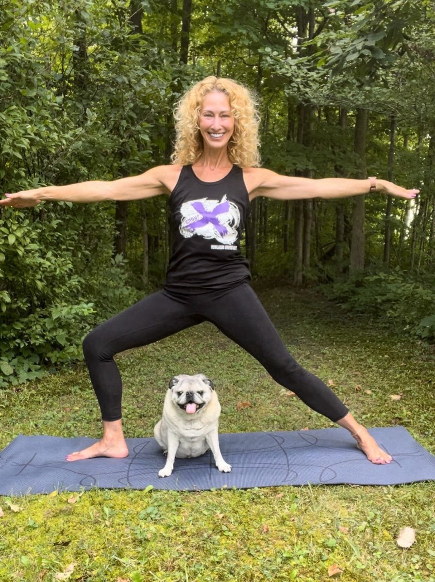 Yoga instructor, Jennifer English, and her companion Mojo.