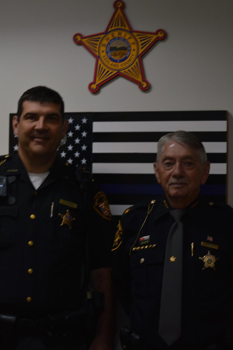 A photo of officers working at the Ashland Sheriffs Department.