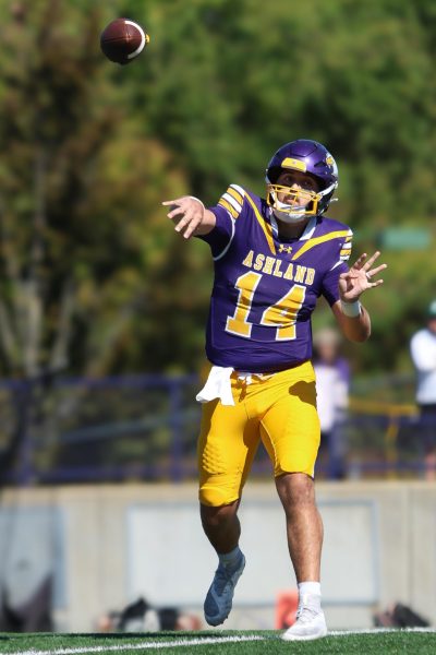 Eagle quarterback Trevor Bycznski throws a pass in the game against the Dragons.