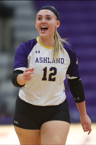 The Eagles' McNamara celebrates on the court with a smile.