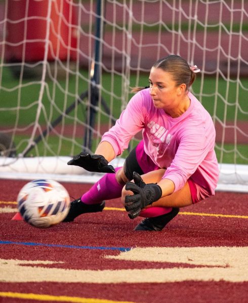 Eagles Goalkeeper Mackenzie Simon saves ball.