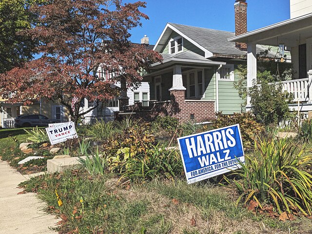 Signs placed in yards across Lancaster, Ohio.