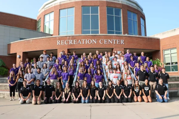 The Recreation Team in front of the entrance