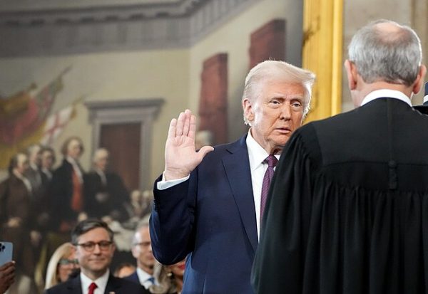 Trump takes the oath of office at 12:00 P.M.