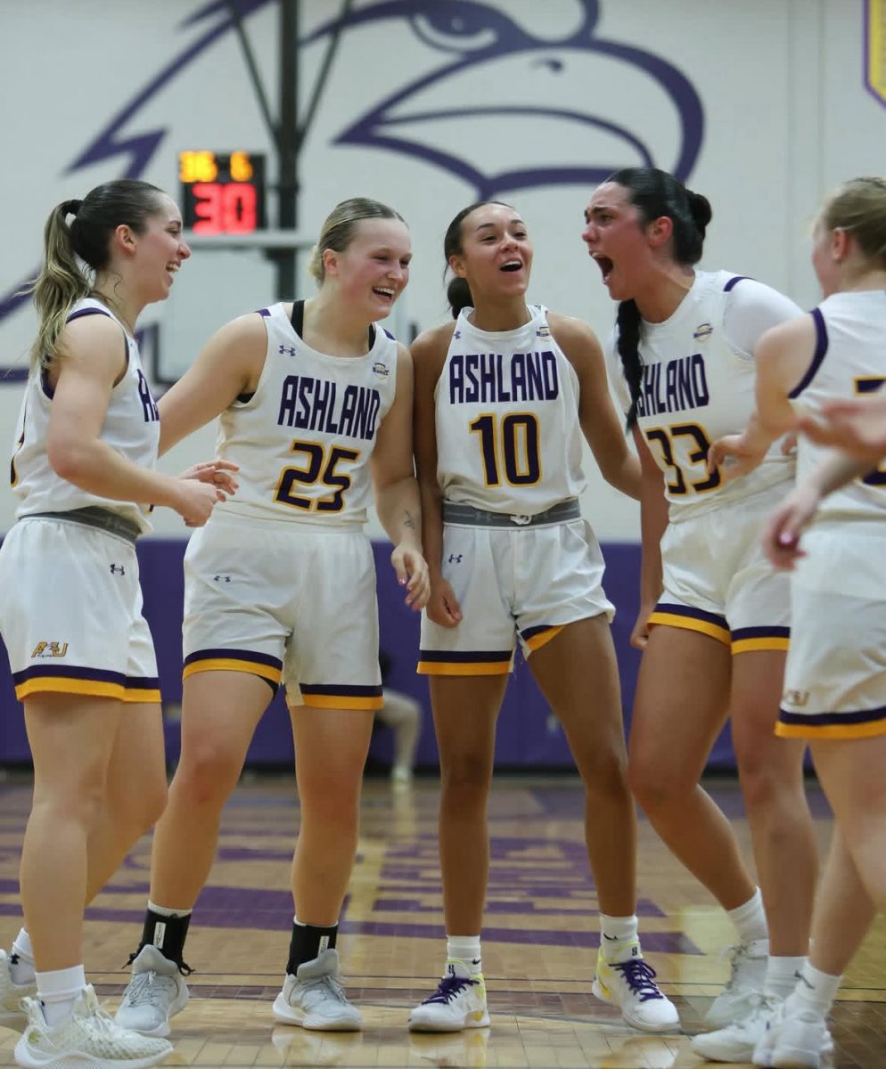 Zoe Miller celebrating with teammates