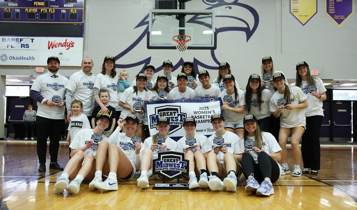 Eagles celebrating after winning their fourth G-MAC title