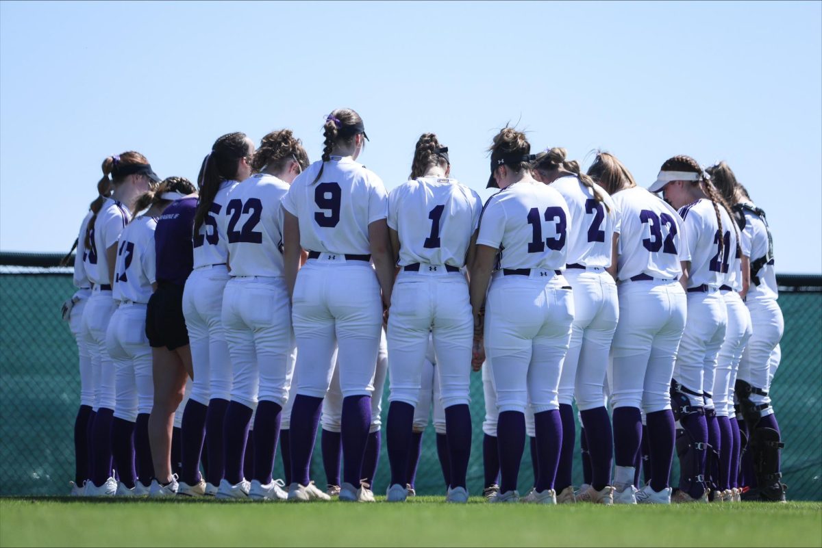 Eagles gathered in a tight huddle before taking on the Spring Games.