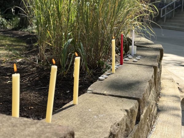 Candles left after the Sept. 9 vigil held by Ashland University’s Nepali community to honor lives lost in protests in Kathmandu.