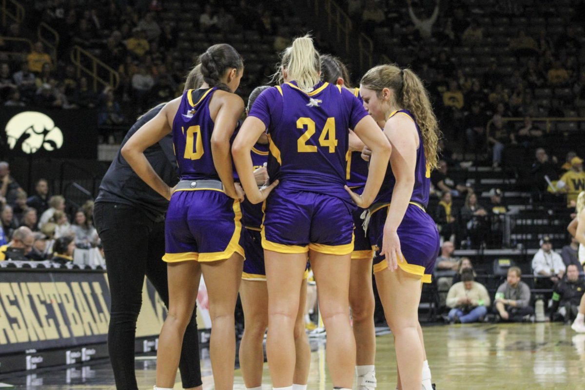 The eagles huddled up after a foul call in their exhibition game against the Iowa Hawkeyes 