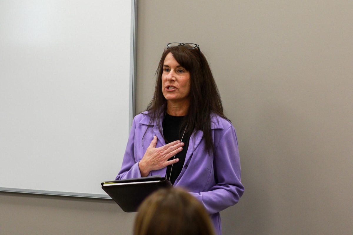 Anne Strouth giving a speech at the new crime lab ribbon cutting ceremony.