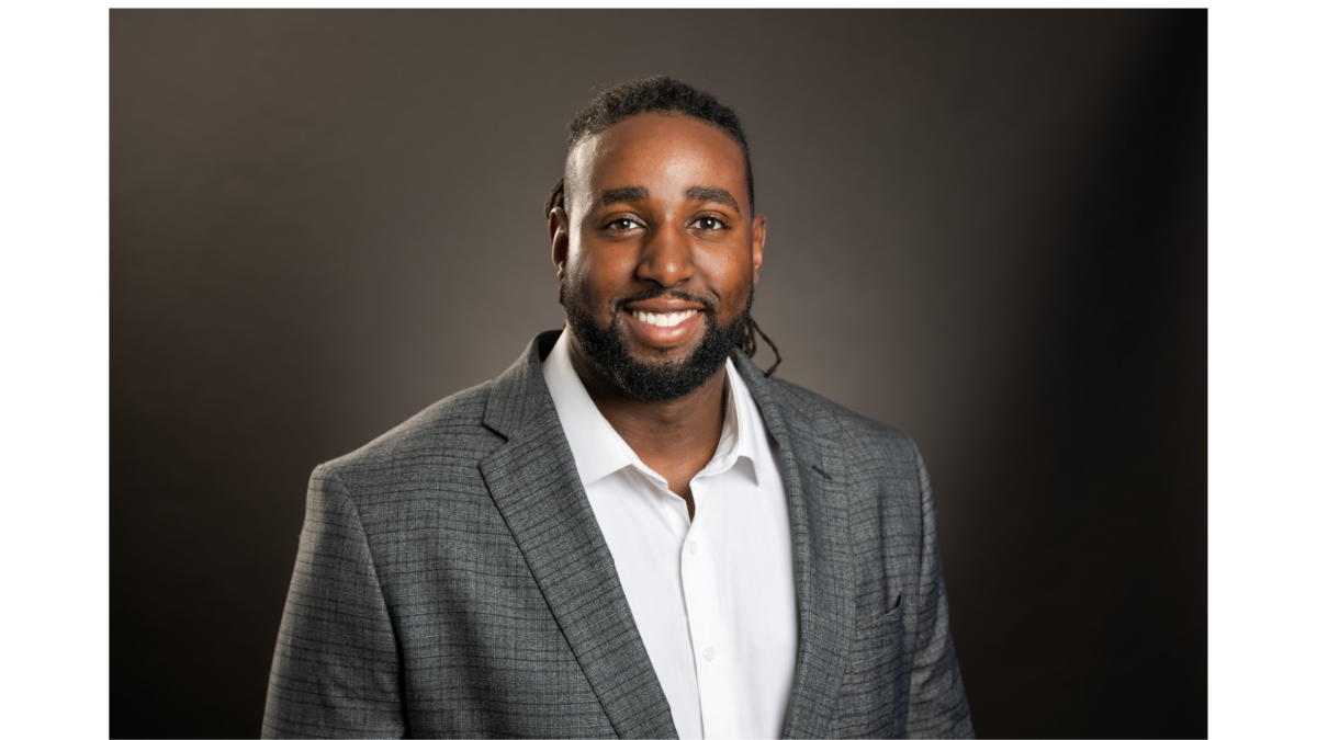 Director of the Center for CommUNITY & Belonging Alex Hill is a former Ashland University student.