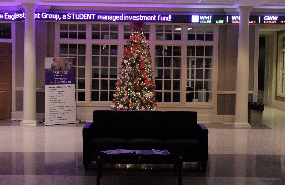 An LED running message in the lobby of COBE displays stocks that are currently managed by the Eagle Investment Group 