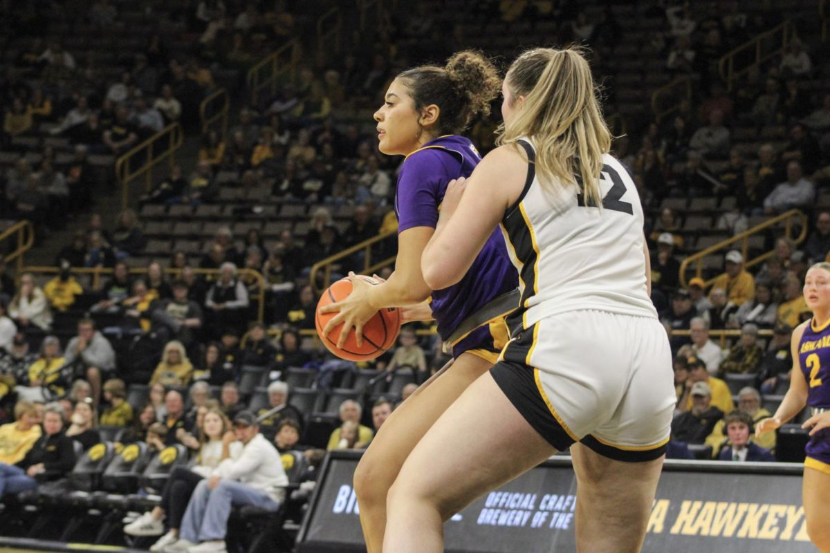 Forward Kyra Hill looking to score in the post at Iowa 