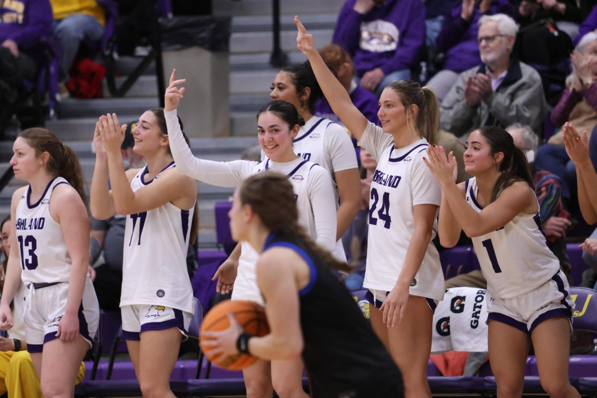 The bench celebrating a 3-point shot