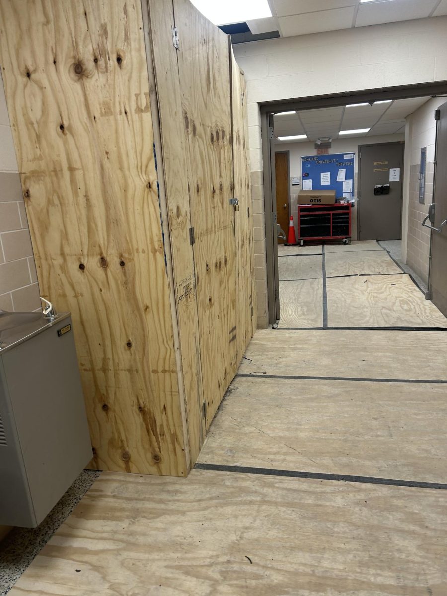 The elevator is being blocked off from use.